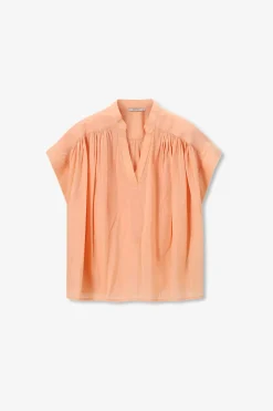 Lichtoranje top met pintuck details