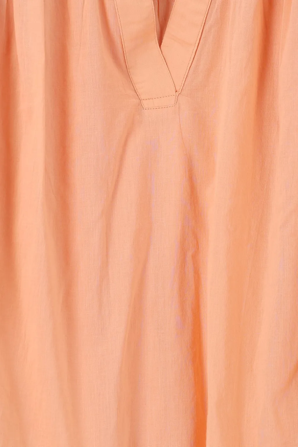 Lichtoranje top met pintuck details
