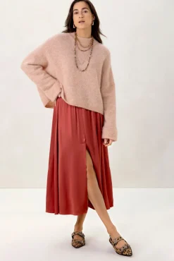 Lichtoranje trui met turtleneck