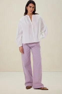 Lichtpaarse mid waist wide leg jeans met strepen