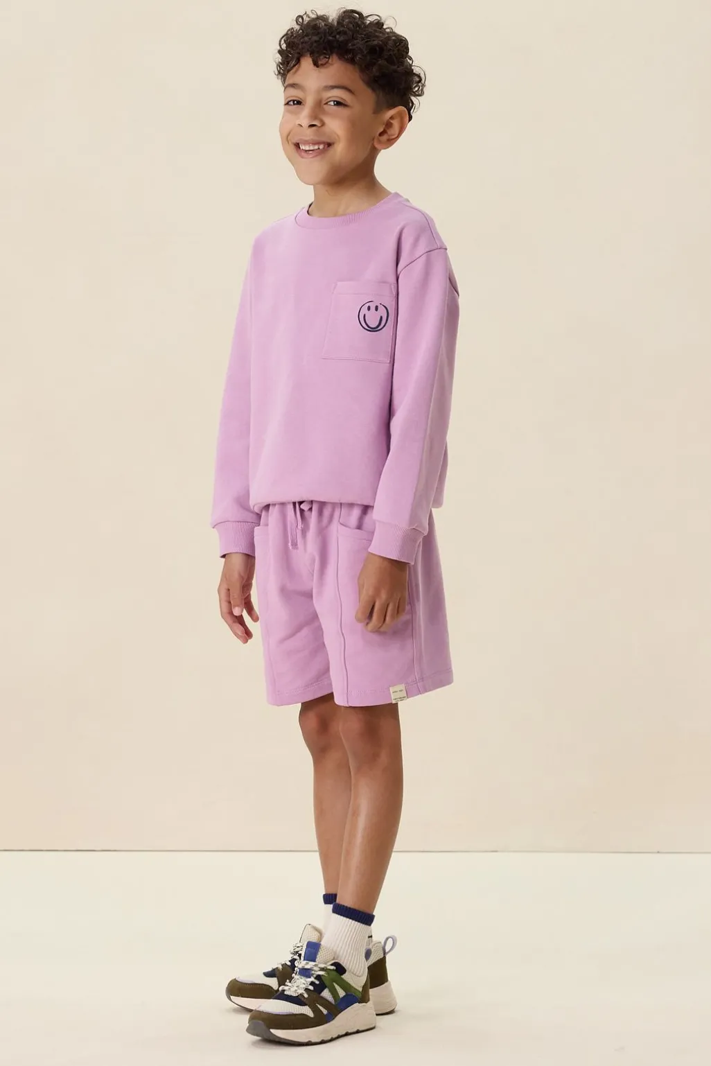 Lichtpaarse sweater met artwork