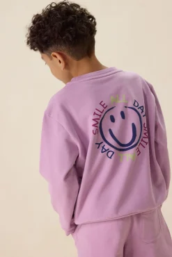 Lichtpaarse sweater met artwork