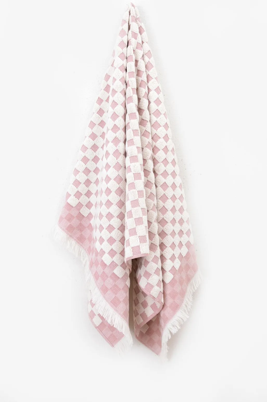 Lichtroze geblokte handdoek