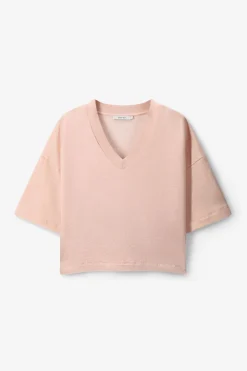 Lichtroze sweater met V-hals
