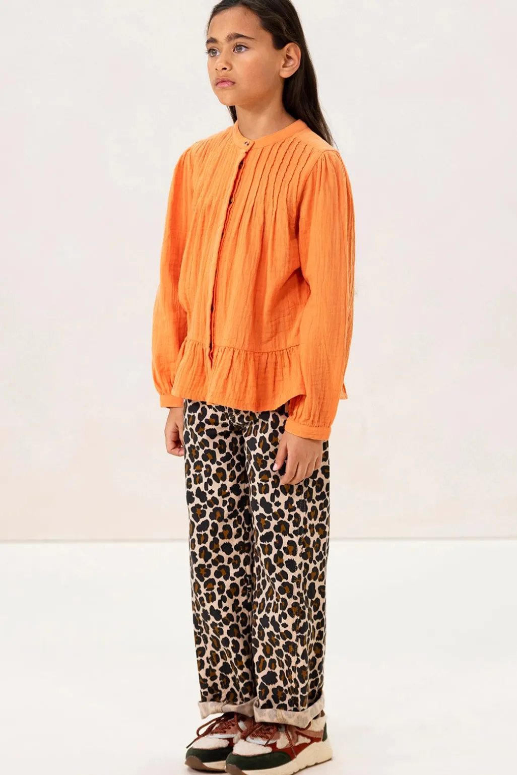 Oranje blouse met pintuck details