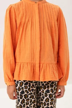 Oranje blouse met pintuck details