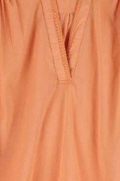 Oranje blouse met plooiing