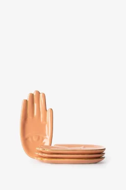 Oranje gebaksbordjes hand