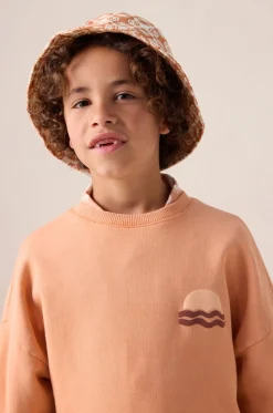 Oranje sweater met artwork