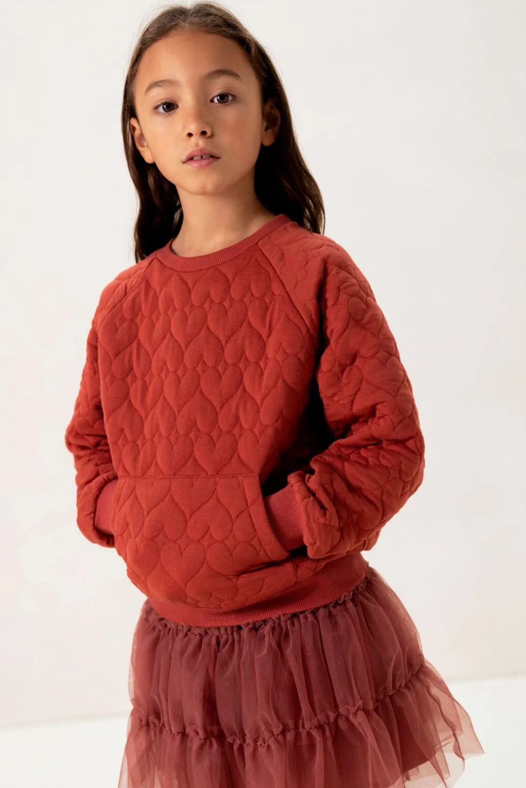 Rode sweater met hartjes quilting