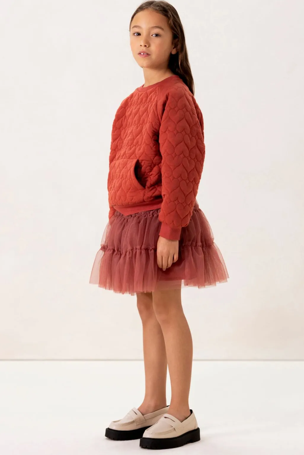 Rode sweater met hartjes quilting
