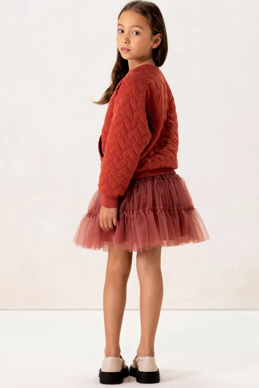 Rode sweater met hartjes quilting