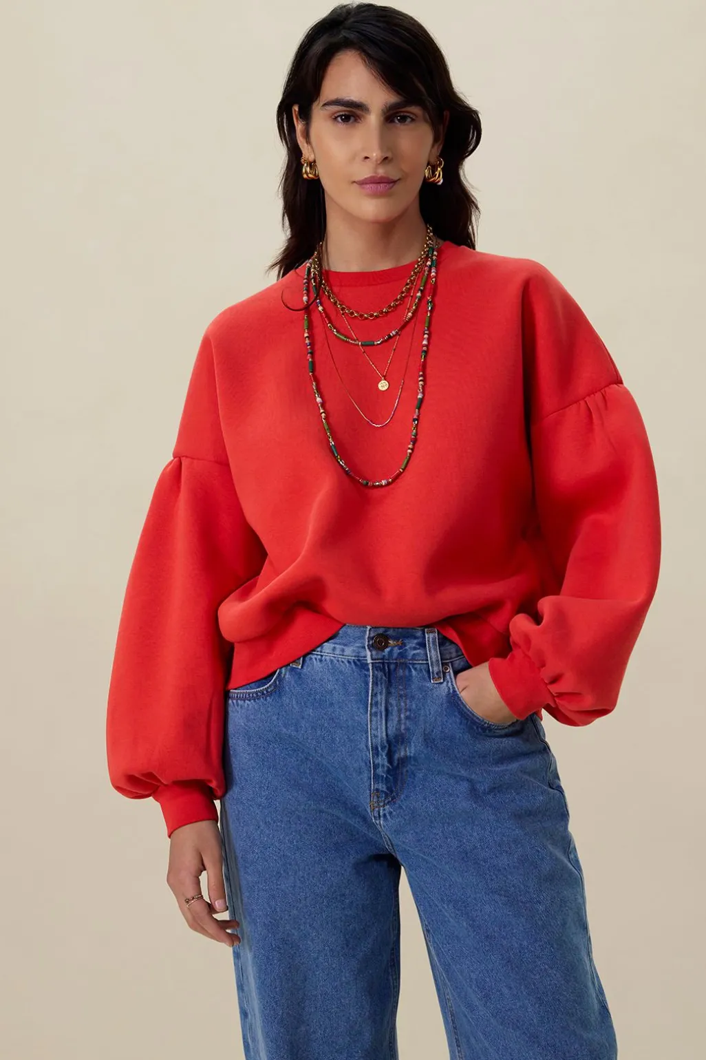 Rode sweater met pofmouwen