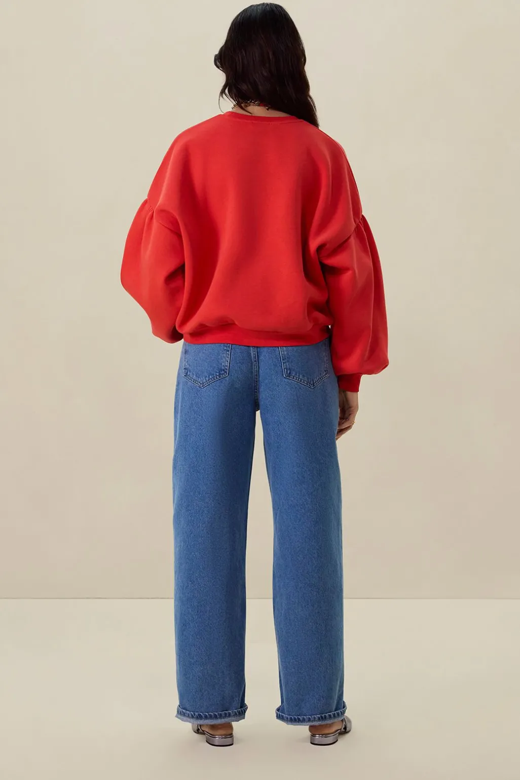 Rode sweater met pofmouwen