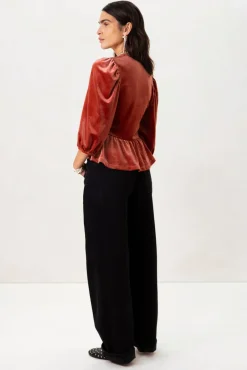 Rode velvet peplum top