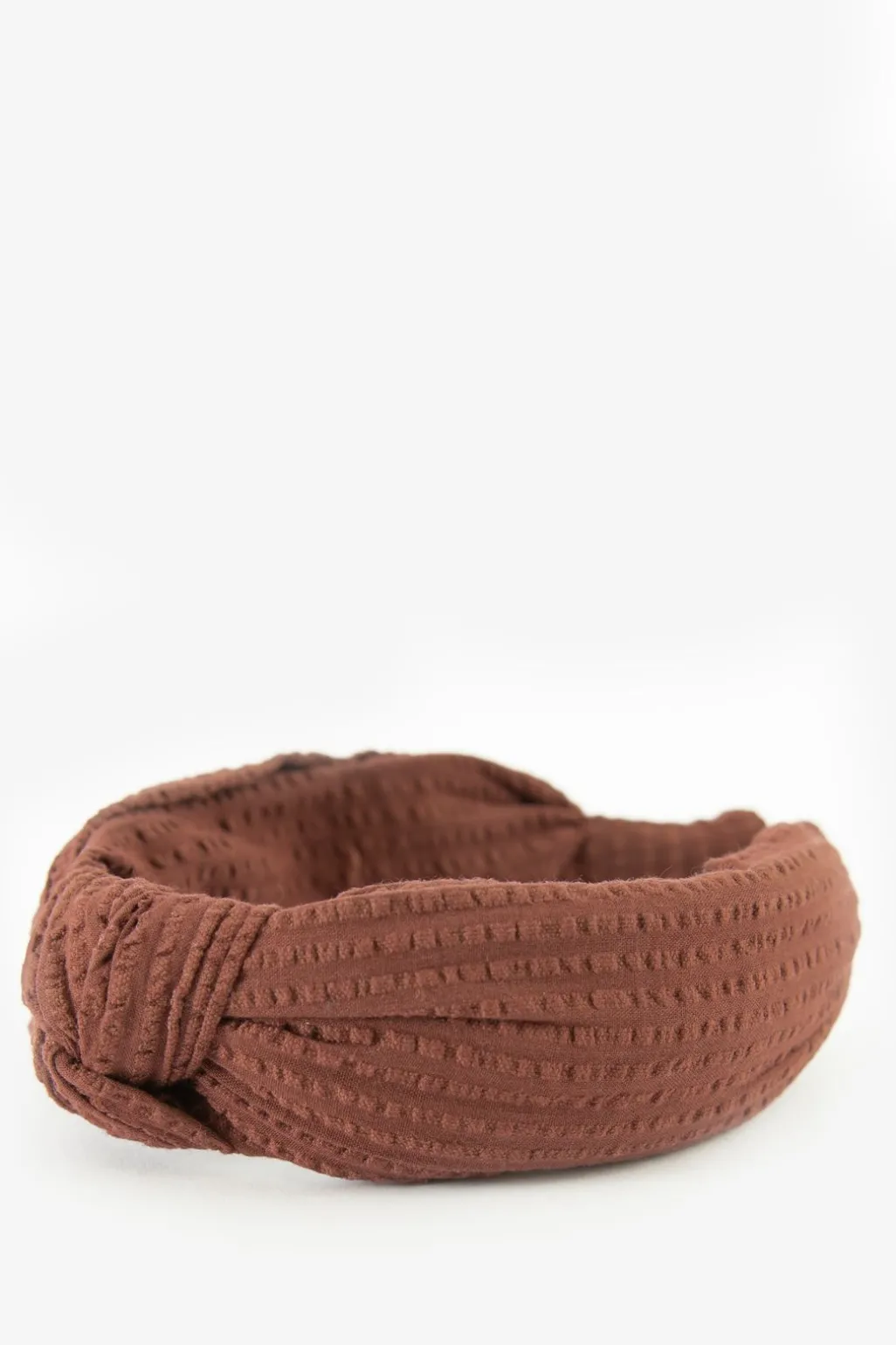 Roodbruine haarband met knoopdetail