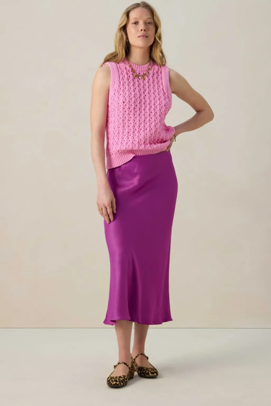 Roze gebreide spencer