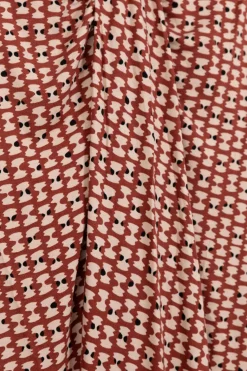 Terracotta midi rok met print en knoopdetail