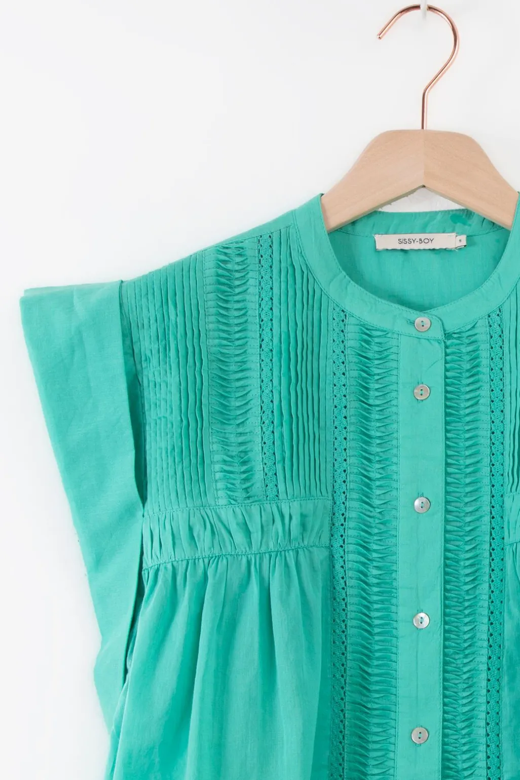 Turquoise mouwloze blouse met pintuck details