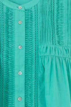Turquoise mouwloze blouse met pintuck details