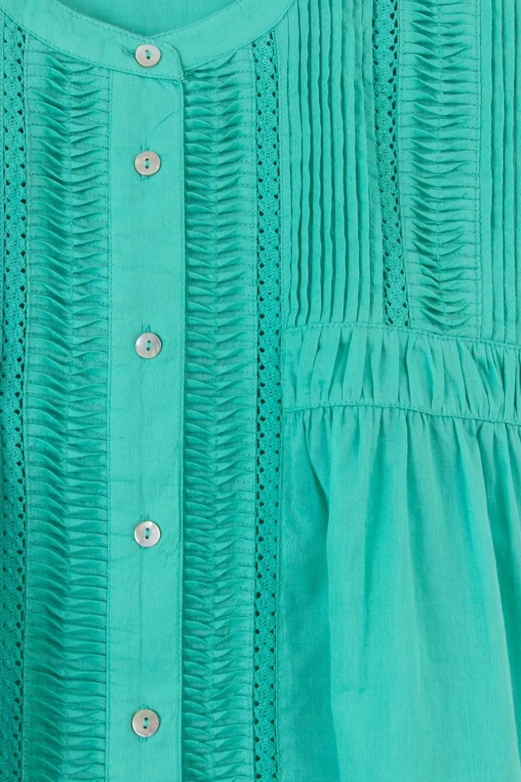 Turquoise mouwloze blouse met pintuck details