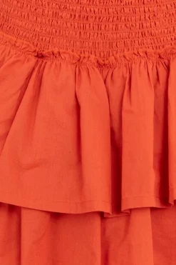 Warm oranje rok met smock details