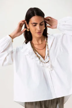 Witte blouse met borduurwerk