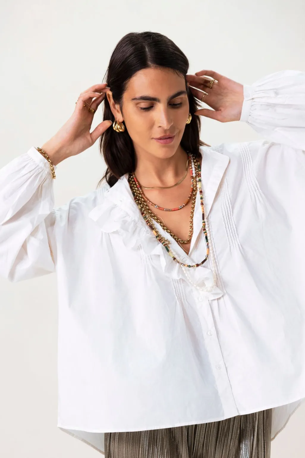 Witte blouse met borduurwerk
