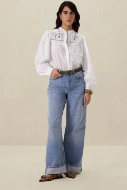 Witte blouse met kanten details