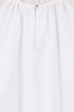 Witte blouse met knoopdetail