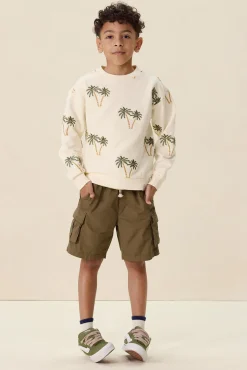 Witte sweater met palmboom