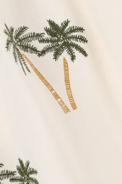 Witte sweater met palmboom