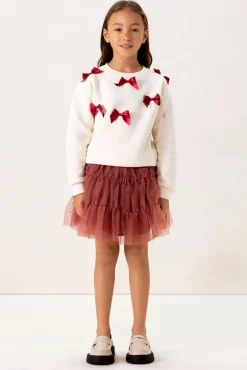 Witte sweater met strikjes